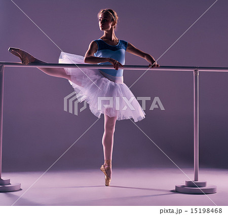 classic ballerina posing at ballet barre classic ballerina posing at ballet barre 15198468