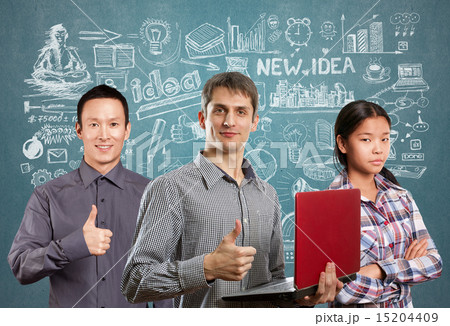 Asian team and man with laptop in his hands and woman Asian team and man with laptop in his hands and woman 15204409