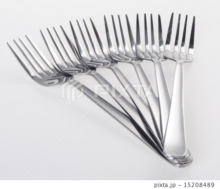 silver fork on white background silver fork on white background 15208489