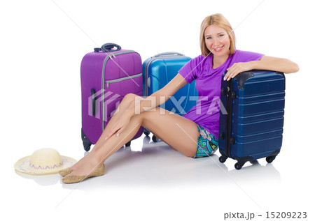 Woman preparing for travel on summer vacation Woman preparing for travel on summer vacation 15209223