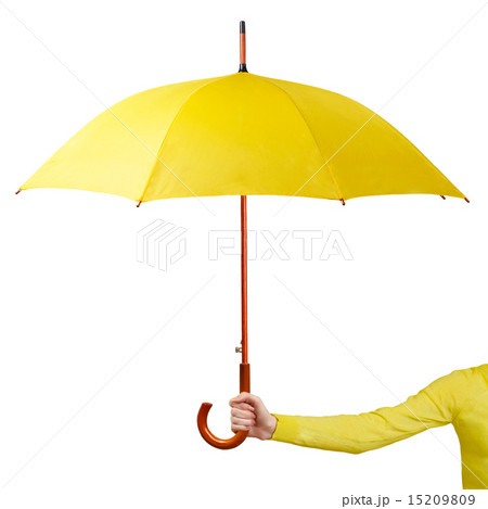 Hand holding a yellow umbrella isolated on white background 15209809