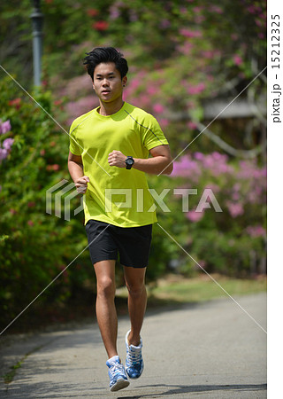 Sport man exercise and jogging in the green park. Sport man exercise and jogging in the green park. 15212325