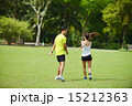 Man and girl are jogging buddy in the green park. 15212363