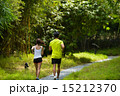 Man and girl are jogging buddy in the green park. 15212370