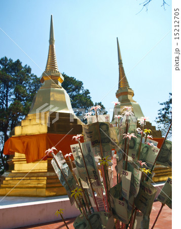 pair of golden pagodas in Chiang Rai in Thailand pair of golden pagodas in Chiang Rai in Thailand 15212705