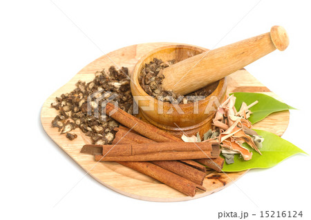 Mortar and pestle with dry herb 15216124