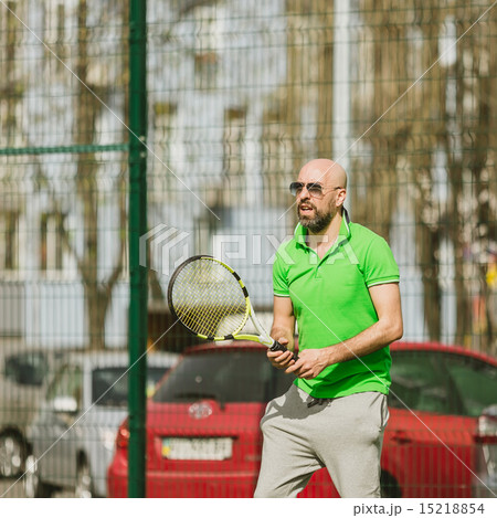 man play tennis outdoor 15218854