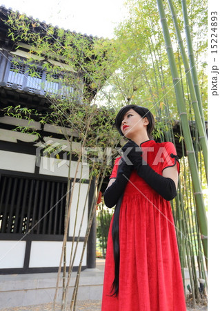 happy Chinese new year. beautiful young Asian woman dress tradit happy Chinese new year. beautiful young Asian woman dress tradit 15224893