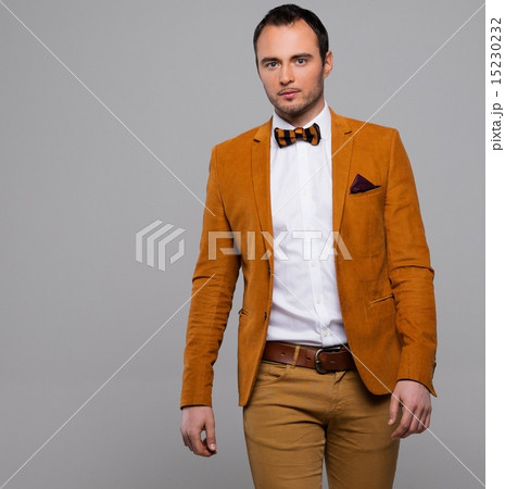 Sharp dressed fashionist wearing jacket and bow tie 15230232
