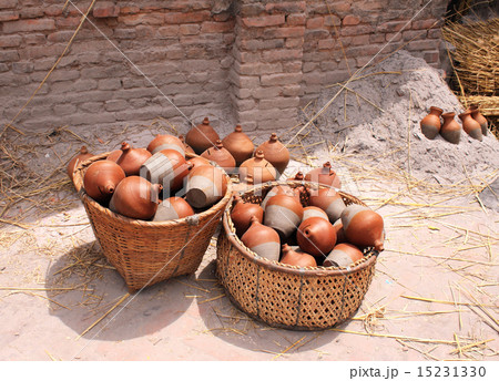 Traditional nepalese pottery in basket Traditional nepalese pottery in basket 15231330
