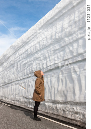 highway along the snow wall. Norway in spring 15234035