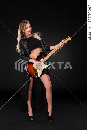 Beautiful girl playing guitar Beautiful girl playing guitar 15236002