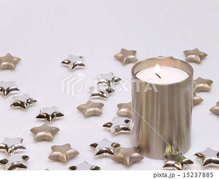 Decoration from burning candle and stars in silver 15237885