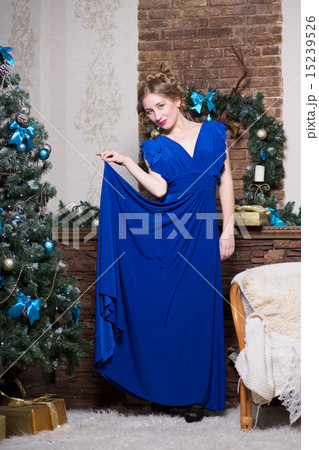 Pretty woman in blue evening dress Pretty woman in blue evening dress 15239526