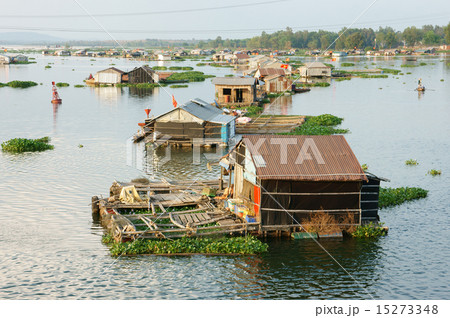 Asian aquaculture, La Nga river, floating house 15273348