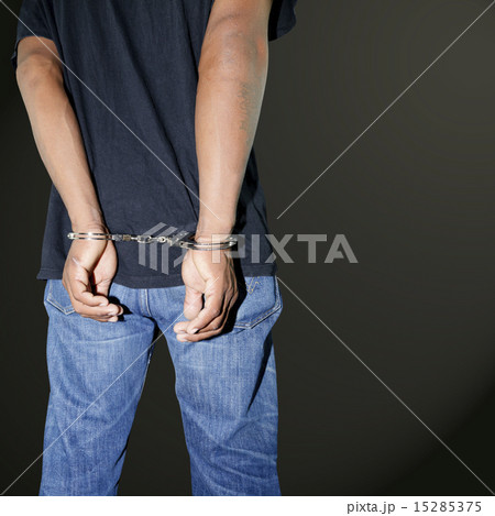 Murderer locked in handcuffs Murderer locked in handcuffs 15285375