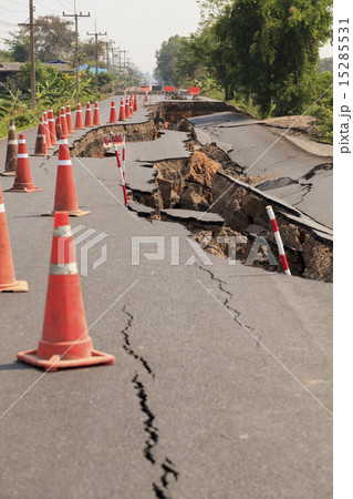 Traffic cones on the cracked asphalt road Traffic cones on the cracked asphalt road 15285531