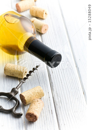 wine cork, corkscrew and bottle of white wine wine cork, corkscrew and bottle of white wine 15288049