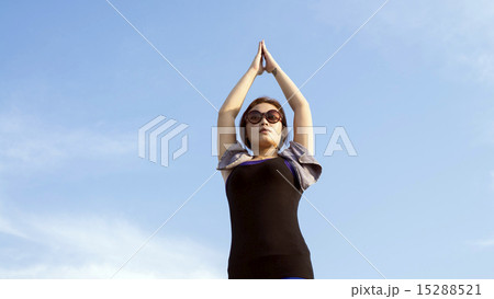 Asian woman exercising outdoors Asian woman exercising outdoors 15288521