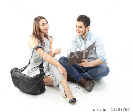 Male female sit on floor discuss talk Male female sit on floor discuss talk 15288760