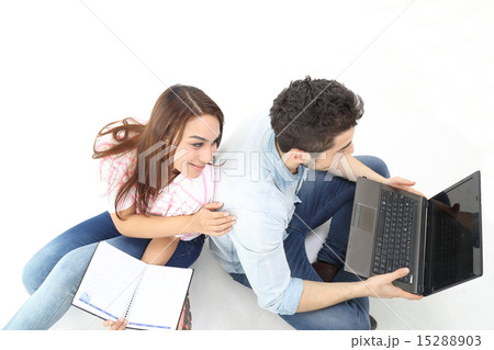Male female laptop study discuss talk top view Male female laptop study discuss talk top view 15288903