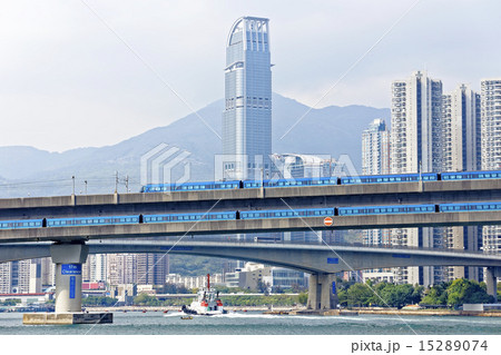 high speed train on bridge in hong kong downtown 15289074
