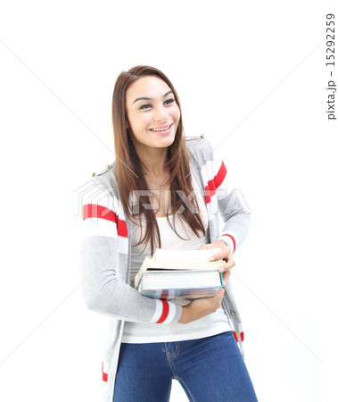 Female carrying heavy book  15292259