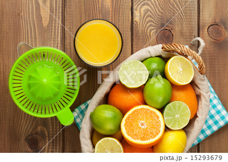 Citrus fruits and glass of juice 15293679
