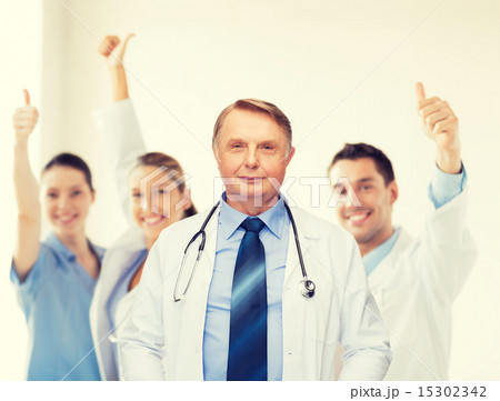 smiling doctor or professor with stethoscope 15302342