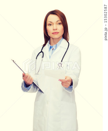 calm female doctor with clipboard 15302587