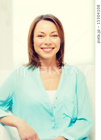 smiling woman at home smiling woman at home 15304108