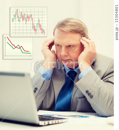 upset older businessman with laptop in office upset older businessman with laptop in office 15304801