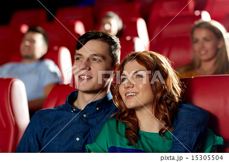 happy friends watching movie in theater happy friends watching movie in theater 15305504