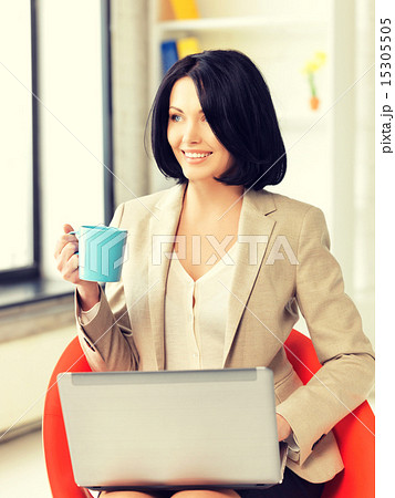 happy woman with laptop computer 15305505