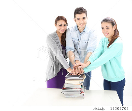 Male female stand hold book stack hands toagether Male female stand hold book stack hands toagether 15305702