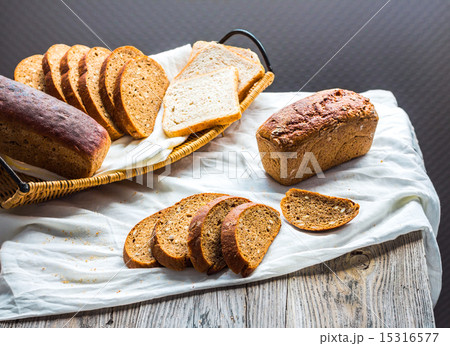 assortment of baked bread, slices of rye bread assortment of baked bread, slices of rye bread 15316577