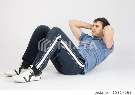 Athlete pumps press the abdomen 15317663