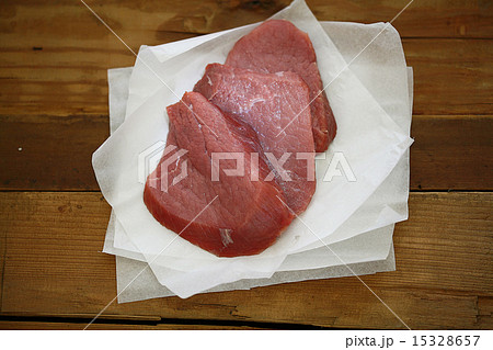 fresh meat tenderloin on the old wooden background fresh meat tenderloin on the old wooden background 15328657