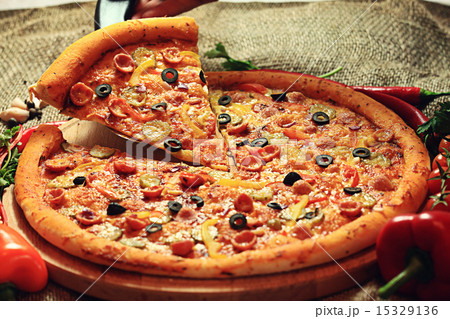 pizza with a slice cut, delicious pastries pizza with a slice cut, delicious pastries 15329136