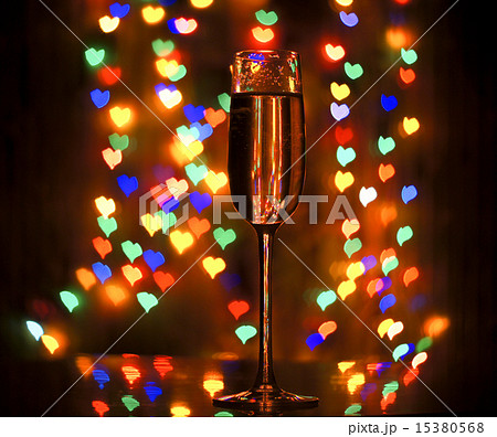glass of champagne on the background bokeh 15380568