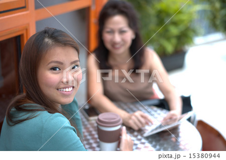 People of two generation using wireless tablet People of two generation using wireless tablet 15380944