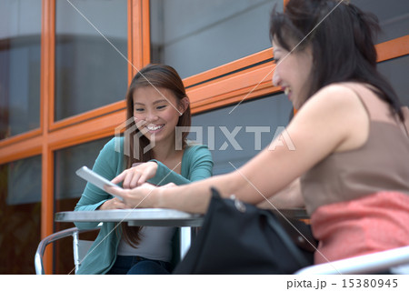 People of two generation using wireless tablet People of two generation using wireless tablet 15380945