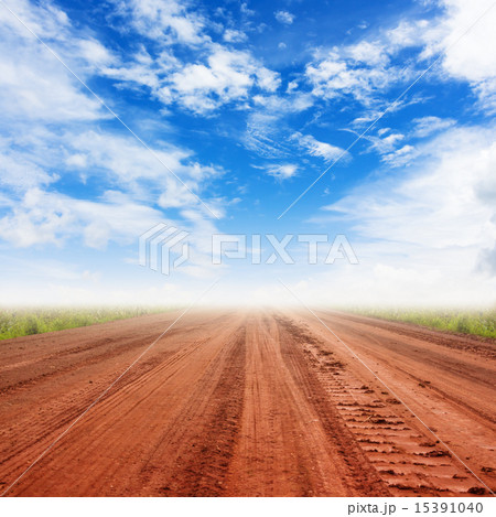 rural road and blue sky with clouds 15391040
