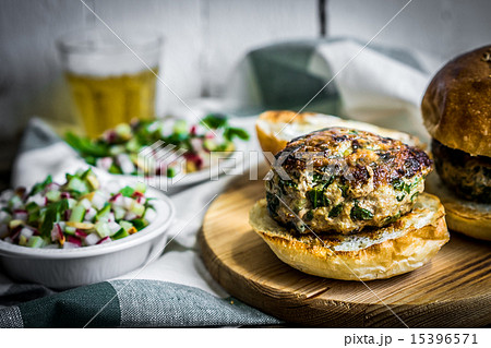 Healthy homemade burger on wooden background Healthy homemade burger on wooden background 15396571