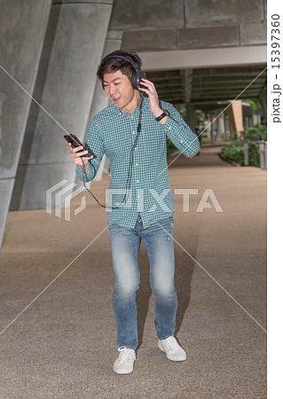Student listening to music 15397360