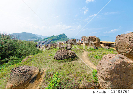 Gorilla rock and arch rock in Yehliu Geopark Gorilla rock and arch rock in Yehliu Geopark 15403764