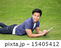 Student lating on the ground 15405412