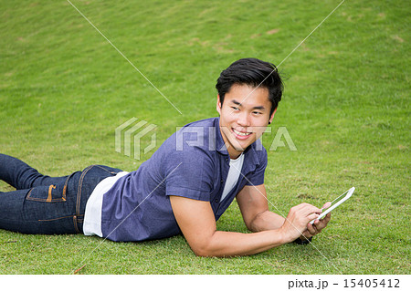 Student lating on the ground 15405412