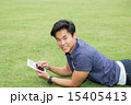 Student lating on the ground 15405413