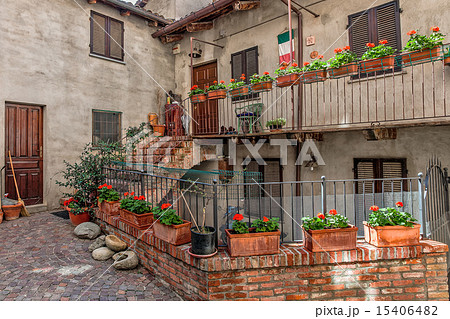 Courtyard, house and balcony with flowers. Courtyard, house and balcony with flowers. 15406482